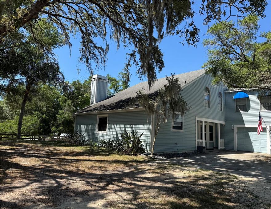 3 bedroom 2 1/2 bath two story home with 2 car garage on 9 acres. Winding Creek / Shady Acres community all homes are on min 5+ acre lots . Great community with Plenty of room for family, fiends and horses. Kitchen has granite counter-tops & cooking island. Kitchen over looks the family room with a stone wood burning fire place. Florida room and back deck has a great view sunsets over a pond. Bonus room above garage is finished under air.  Property is completely Fenced.