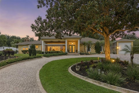 Photo of 12128 Lakeshore Drive, Clermont, FL 34711 (MLS # O6409257)