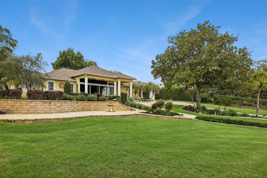 Photo of 12128 Lakeshore Drive, Clermont, FL 34711 (MLS # O6409257)