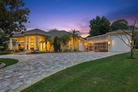 Photo of 12128 Lakeshore Drive, Clermont, FL 34711 (MLS # O6409257)