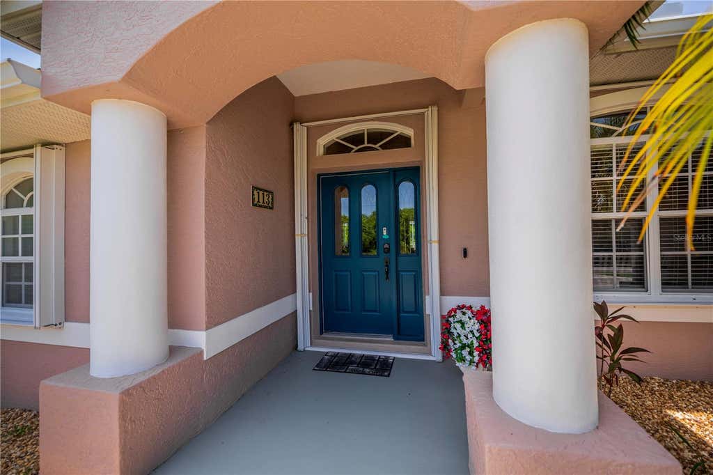 Photo of 113 Red Cedar Park, Rotonda West, FL 33947 (MLS # C7527544)