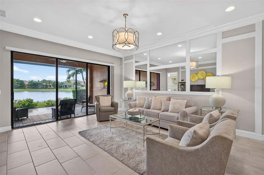 Photo of 11957 Five Waters Circle, Fort Myers, FL 33913 (MLS # C7529070)