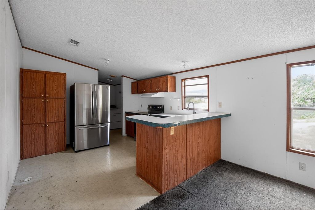 Photo of 3240 Baird Avenue, Lakeland, FL 33805 (MLS # O6404149)