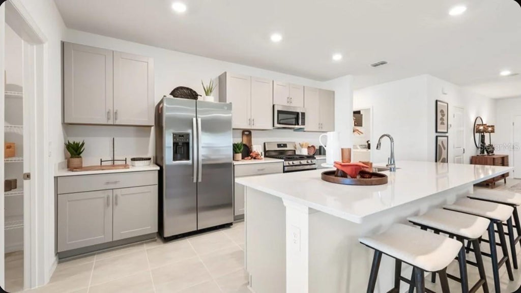 Photo of 13321 Commons Avenue, Parrish, FL 34219 (MLS # TB8544699)