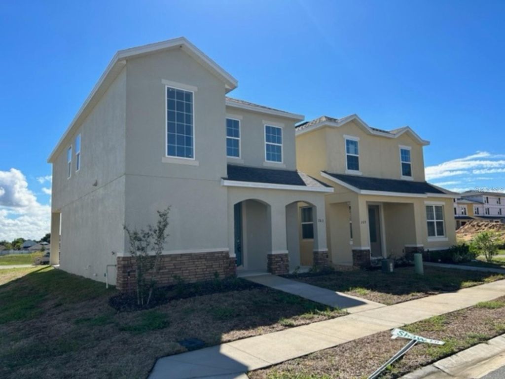 Photo of 263 Bella Prestwick Boulevard, Davenport, FL 33837 (MLS # S5141341)