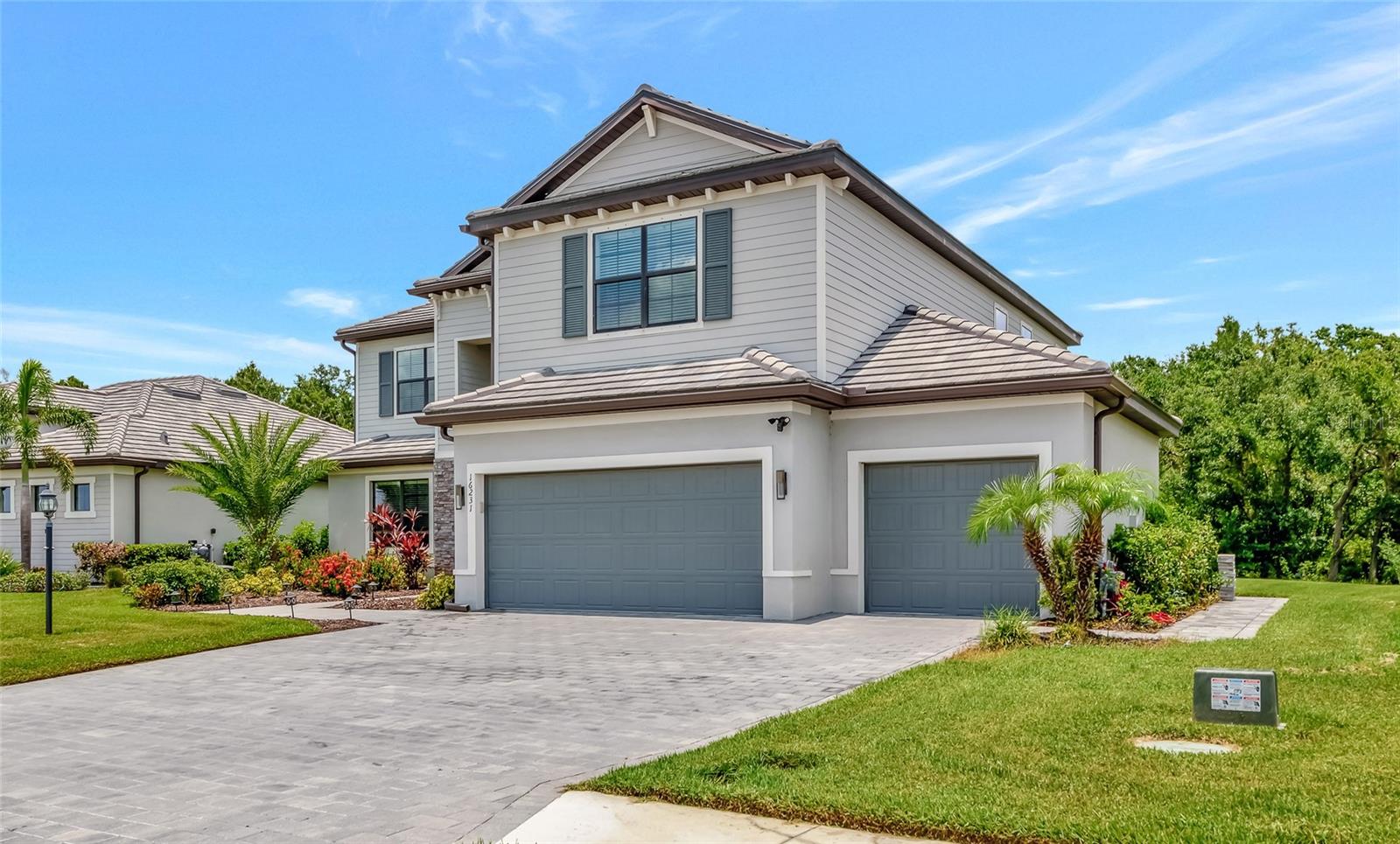 Welcome to the National—one of the most sought-after floor plans in the highly desirable, amenity-rich community of Lorraine Lakes in Lakewood Ranch!
This expansive home offers 6 bedrooms, 3 bathrooms, a 3-car garage, and over 3,500 square feet under air—perfect for large families or anyone who loves to entertain.
Downstairs, you'll find a private office/den, a spacious guest bedroom next to a full pool bath, and a stunning open-concept kitchen that will impress even the most discerning chef. The gourmet kitchen features 42-inch white cabinetry, quartz countertops, a gas cooktop, built-in microwave, and wall oven. Adjacent to the kitchen is a cozy breakfast nook and a formal dining room ideal for hosting gatherings. The great room offers a dramatic focal point with a stacked-stone electric fireplace—perfect for cozy nights in.
Step outside to your private backyard oasis, featuring a custom 50x50 heated pool and raised spa that seats 8, all easily controlled from your smartphone.
Upstairs, discover a versatile layout with 4 additional bedrooms plus a loft, and a flex room currently set up as a home theater. The primary suite is massive, featuring dual walk-in closets and a luxurious en-suite bathroom with separate vanities, a soaking tub, and a walk-in shower.
Living in Lorraine Lakes means enjoying low-maintenance living, with lawn care, irrigation, cable, and internet all included in your HOA dues. The resort-style amenities are unmatched.
24-hour guard-gated entrance, massive clubhouse with a fitness center, saunas, indoor basketball court, arcade & game room, tennis, pickleball, and outdoor basketball courts.
Onsite restaurant and bar (indoor and outdoor dining)
Full-time lifestyle director, curating a year-round social calendar
It’s no surprise Lorraine Lakes has been named one of the top-selling communities in Lakewood Ranch. This home is move-in ready and loaded with upgrades—don’t miss your chance to live the lifestyle you've been dreaming of!