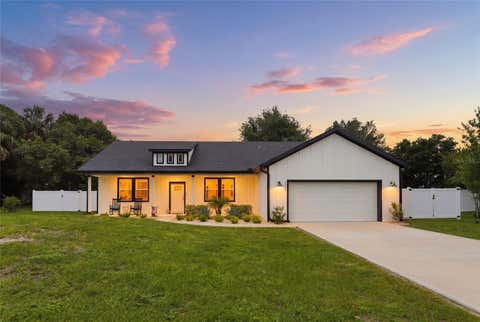 Photo of 1724 Santiago Street, Deland, FL 32720 (MLS # V4949176)