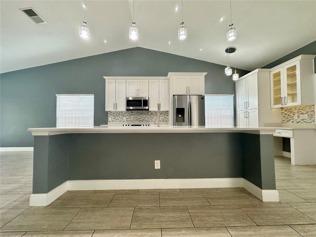 Photo of 1516 Crosswind Circle, Orlando, FL 32825 (MLS # O6425442)