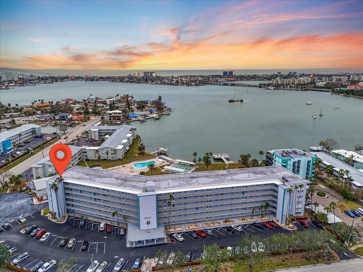 Welcome to your serene retreat in the highly desirable Shore Towers 55+ community, where modern comfort meets breathtaking water views. This fully furnished penthouse unit offers panoramic vistas of Boca Ciega Bay, providing a tranquil backdrop for your daily life. Relax in the light-filled sunroom and soak in the beauty of the sparkling water below. Take full advantage of Florida’s coastal lifestyle with access to a glistening pool, private docks, and outdoor spaces perfect for relaxation and recreation.
Inside, the updated kitchen boasts sleek countertops, contemporary cabinetry, and a brand-new range and microwave, making meal preparation a breeze. The in-unit laundry area, equipped with a washer and dryer, adds convenience to your everyday routine. The spacious living area, designed with seamless indoor-outdoor flow, provides a perfect space for both unwinding and entertaining.
Located in vibrant South Pasadena, FL, you’ll be just minutes away from the world-renowned white sands of St. Pete Beach. Explore nearby charming shops, waterfront dining, and local markets, or spend your day outdoors in scenic parks like Boca Ciega Millennium Park. The area’s vibrant community and proximity to downtown St. Petersburg’s cultural attractions, including museums and performing arts venues, ensure there’s always something exciting to do.
This furnished penthouse condo is more than just a rental; it’s your gateway to a dream waterfront lifestyle. Don’t miss out on this incredible opportunity! Schedule a tour today and make this coastal oasis your next home. Contact us now to secure your slice of paradise!