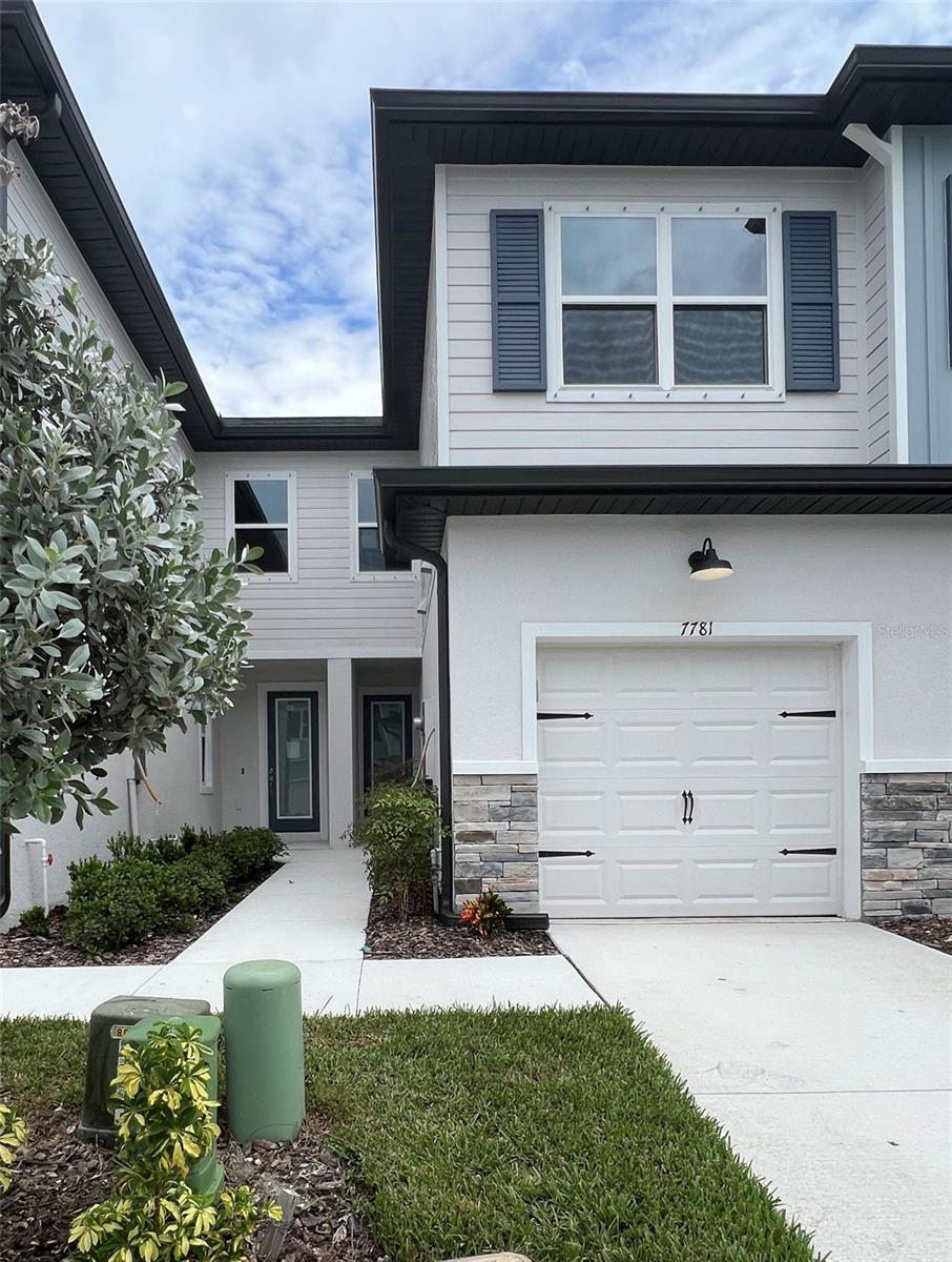 Move in ready 2 Bed, 2½ Bath townhome featuring a covered 1 car garage and 1,534 sq ft of modern, open-plan living space. Located in the boutique coastal community of The Towns at Long Bayou, in Seminole, this home blends stylish luxury with a relaxed lifestyle and minimal upkeep. Stylish kitchen design includes light cabinetry with soft close doors and polished hardware, quartz countertops, coordinating ceramic tile backsplash, luxury vinyl plank flooring and stainless-steel appliances opening to a great room with tranquil pond views and a slider to a covered lanai. First-floor powder room conveniently tucked beneath the stairs. 9’ ceilings keep the upstairs open and airy, in the versatile loft, ideal as an office, studio, workout area, or gaming lounge. Primary suite is quietly located at the rear of second floor with large windows for abundant natural light, peaceful views, and ensuite with walk in shower. Down the hall, the Guest bedroom and hall bath remain private. Conveniently placed upper-level laundry space near the bedrooms. Just minutes to the popular area beaches and John’s Pass Village make this the perfect location for beach lovers and marina outings. Shopping, dining, nightlife, fitness, arts and music venues are all nearby! The neighborhood was raised to Flood Zone X!! Make your appointment today!