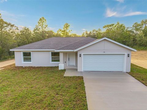 Photo of 732 SW Fig Tree Lane, Dunnellon, FL 34431 (MLS # OM709952) Photo of 732 SW Fig Tree Lane, Dunnellon, FL 34431 (MLS # OM709952)