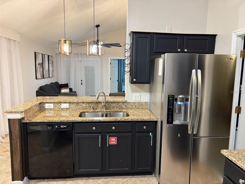 Photo of 142 Hollingshead Loop, Davenport, FL 33896 (MLS # O6357309)