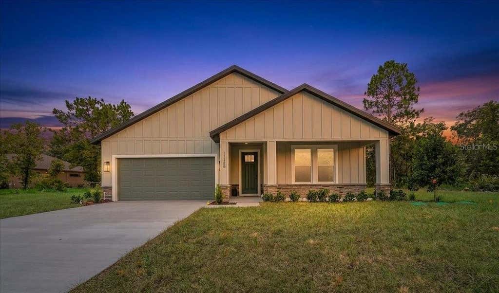 Photo of 11188 Seattle Wren Avenue, Weeki Wachee, FL 34614 (MLS # O6428614)
