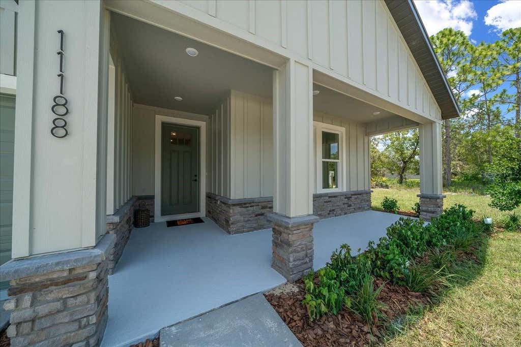 Photo of 11188 Seattle Wren Avenue, Weeki Wachee, FL 34614 (MLS # O6428614)