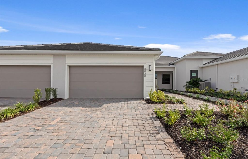 Photo of 18828 Indian Rock Place, Lakewood Ranch, FL 34211 (MLS # TB8437186)