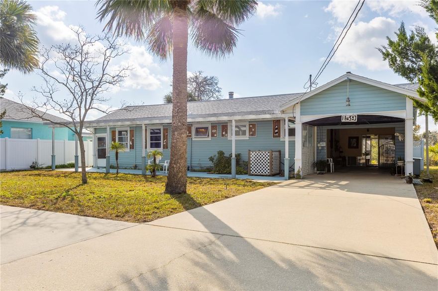LOCATION, LOCATION, LOCATION! Arguably the best street in Flagler Beach with Intracoastal access and views to make you the envy of your circle of friends. This cute little beach cottage sits on just under a half-acre of land surrounded by palm trees and saw palmettos which line the enormous driveway. You can see the waterway from almost every room in this adorable abode that just sings Old Florida Charm. The small, fully screened inground pool has a newer pump but will need a little facelift (there are no detectable leaks). Repairs and a little TLC will make this home your own but everything works as it should with a newer roof, hot water heater, and HVAC. Live in now, renovate later before this rare oversized, beachside Intracoastal front property, in a trendy golf carting community, is gone. Priced competitively to sell quickly in As Is condition, so don't delay on this truly one-of-a-kind property. Call today for a private tour!!