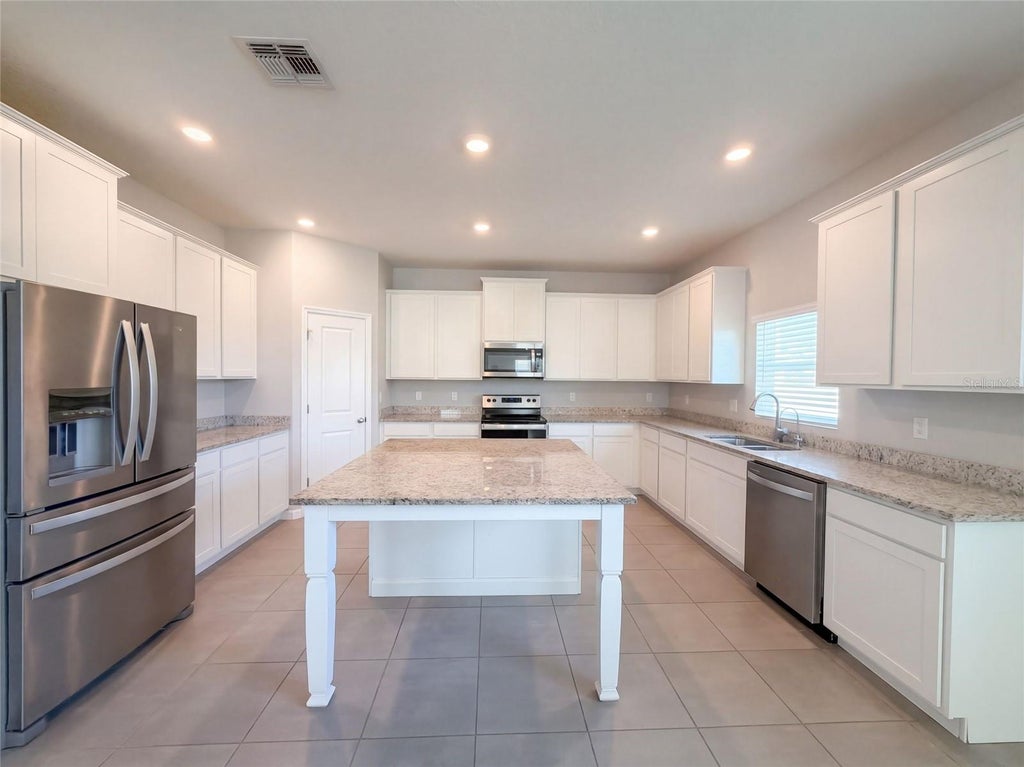 Photo of 585 Barrier Reef Street, Ruskin, FL 33570 (MLS # O6450058)