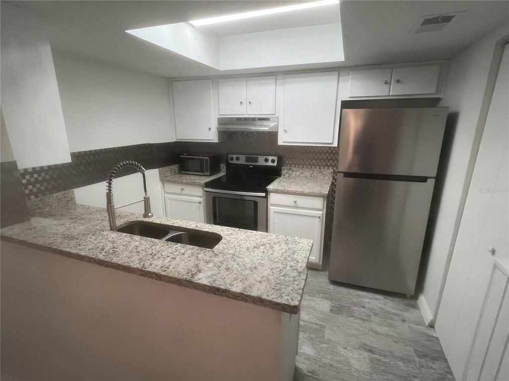 Photo of 4303 SW 70th Terrace, Gainesville, FL 32608 (MLS # O6403472)