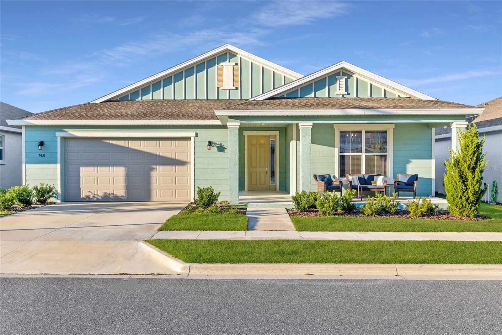 Why wait to build at premium prices when this expansive Larkspur model home is competitively priced and move-in ready? With over 3000 square feet of living space, this nearly new residence offers room to breathe, grow, and entertain in style. Located in the all-ages Calesa master-planned community, it blends exceptional construction with thoughtful design that caters to modern lifestyles. Inside, the open-concept layout creates a sense of volume and flow, enhanced by soaring ceilings, LED downlighting, and sleek tile floors. The gathering room features pocket sliding glass doors that open to a screened and covered lanai—an ideal extension of your living space for peaceful mornings or relaxed outdoor entertaining. The gourmet kitchen is generously sized, with granite countertops, a spacious island for casual dining, and stainless steel appliances, including a gas range. Shaker-style cabinets with crown molding accents and a stylish tile backsplash complete the look, offering both beauty and functionality. A bonus flex room with glass inset French doors provides additional space for hobbies or a home office, while a separate nest area offers room for a secondary refrigerator and can serve as a buffet or party-prep zone. The owner’s suite is a true retreat, featuring two walk-in closets and a spa-like ensuite bath with a double sink vanity, a tile-lined walk-in shower, and a separate soaking tub. Two of the large guest rooms share a Jack and Jill bath and include spacious walk-in closets, ensuring comfort and privacy for everyone. Beyond the home, residents enjoy a wealth of amenities, including a community pool, scenic walking and biking trails, basketball courts, a dog park, playgrounds, and access to the Florida Aquatics Swimming and Training (FAST) facility. And future neighborhood plans include the addition of outdoor amphitheater space with a beer garden, a food truck village, a tap room, and a coffee house. Don’t miss your chance to own this spacious, move-in-ready gem. Schedule your private tour today and experience the lifestyle you’ve been waiting for.