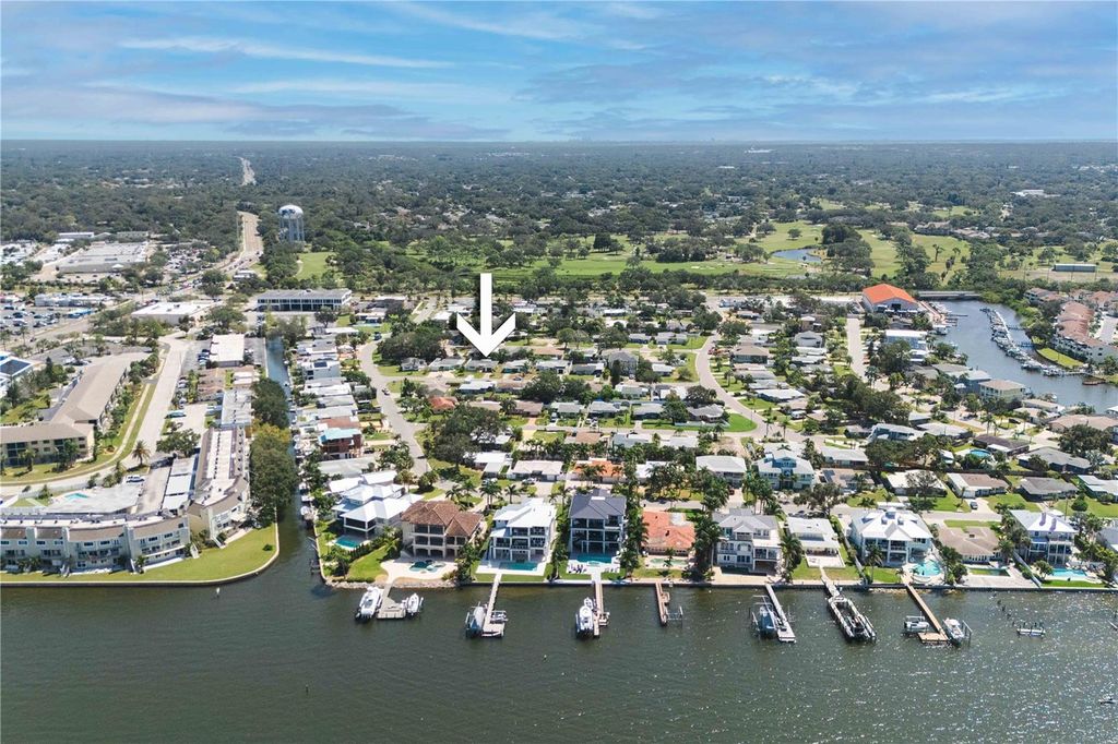 Photo of 2491 Coronado Way, Dunedin, FL 34698 (MLS # O6347300)