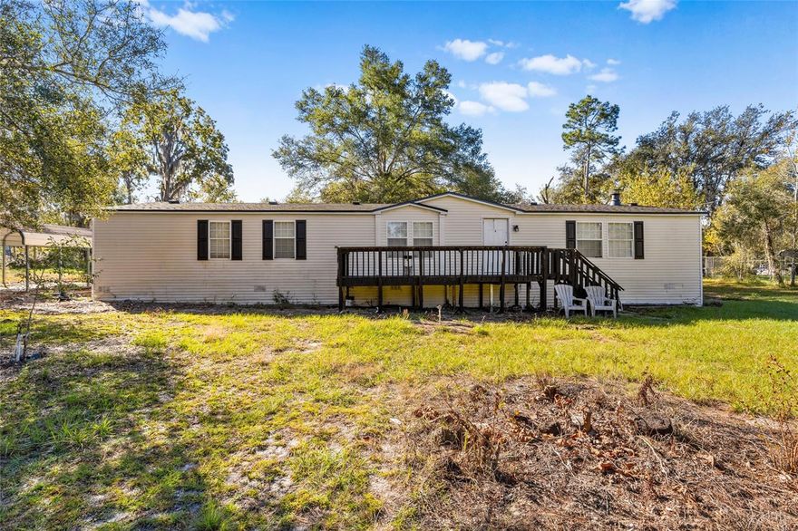 Welcome to your peaceful retreat in beautiful Bronson, Florida! This spacious 3-bedroom, 2-bathroom manufactured home sits on 1.25 acres, offering 1,944 square feet of comfortable living space surrounded by nature.

Inside, you’ll find an open floor plan perfect for both relaxation and entertaining. The kitchen and bathrooms have been completely remodeled, showcasing brand new stainless steel appliances and stylish modern finishes. The bright, functional kitchen flows effortlessly into generous living and dining areas—ideal for family gatherings or quiet evenings at home.

Recent upgrades provide peace of mind, including a new roof (2025) and a new A/C system (2025), ensuring years of worry-free living. The owner’s suite features a private bath and ample closet space, while the split-bedroom layout offers privacy for everyone.

Step outside and enjoy your own slice of country life—there’s plenty of space for gardening, outdoor projects, or simply soaking in the quiet surroundings.

Located just minutes from downtown Bronson and within easy reach of Gainesville, this home perfectly blends modern comfort with rural charm. Whether you’re a first-time buyer or looking for extra space and freedom, this beautifully updated property is move-in ready and waiting for you to call it home.