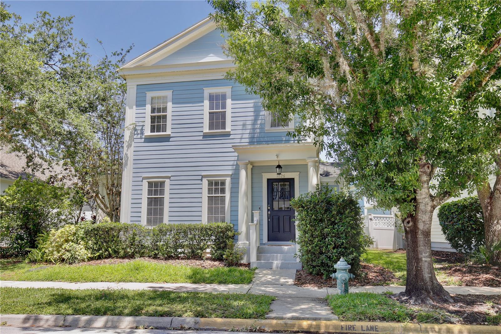 Nestled in the coveted Walt Disney planned community of Celebration, this remarkable 4-bedroom, 3-bathroom home with an additional 1-bedroom separate apartment/guest suite is a must-see! Boasting a spacious living room, a well-appointed chef's kitchen complete with stainless steel appliances and granite countertops, and a separate formal dining room perfect for hosting large gatherings, this home is ideal for entertaining guests.The first floor features a versatile bedroom with dual pocket doors and bright windows, providing an abundance of natural light and making it the perfect space for a home office. The second level offers a sizable master bedroom with a tray ceiling, a large walk-in closet, and a newly renovated master bath, as well as two additional bedrooms sharing a Jack and Jill bathroom.This home has undergone many updates, including luxury vinyl flooring on the first floor, upgraded carpeting, and renovated bathrooms throughout, making it move-in ready. The apartment also features new carpeting and a new AC unit. The roof was replaced in 2018, and the hot water heater was replaced in 2020.The apartment above the 2-car garage offers a separate entrance and its own stackable washer/dryer, making it perfect for generating extra income or housing guests. The current tenant is paying $1,450 a month and is on a month-to-month lease.Residents of Celebration enjoy access to numerous parks, playgrounds, and miles of bike and walking trails. Located just a few miles from the world-famous Walt Disney World, Universal, and SeaWorld, and the famous International Drive, this home is perfectly situated for taking advantage of all the attractions Orlando has to offer.
