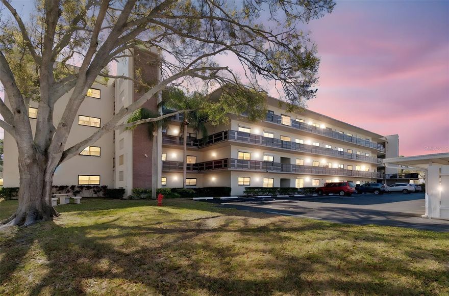 Welcome to 8199 Terrace Garden Drive N #114, located in the desirable Quincy building within the Five Towns community in St. Petersburg. This ground-floor condominium offers a comfortable and functional layout with beautiful pond views and the convenience of step-free access. The screened porch provides a peaceful setting overlooking the water, creating an ideal space to enjoy morning coffee or unwind while taking in the tranquil surroundings. Impact-resistant windows and a newer impact-rated sliding glass door enhance both comfort and peace of mind while allowing natural light to fill the living spaces.

Inside, the kitchen combines classic cabinetry with newer stainless-steel appliances, including a gas range, and features filtered water at the sink for added convenience. Both bedrooms are generously sized and include walk-in closets, while additional closets throughout the residence provide abundant storage options, including a storage shelf in a second-floor storage room with a community work bench.  The spacious laundry and utility room is a standout feature, offering a full-size washer and dryer, utility sink, and ample room for storage, hobbies, or a flexible workspace. The second bathroom has been thoughtfully designed for accessibility, featuring a roll-in shower and open sink area to accommodate a variety of mobility needs, enhancing the unit’s versatility and functionality.

Five Towns is a well-established residential community known for its beautifully maintained grounds and wide range of amenities designed to support an active and engaging lifestyle. Residents have access to multiple heated pools, clubhouses, fitness facilities, walking paths, recreational courts, social activities, and gathering spaces that foster a strong sense of community. The Quincy building enjoys a convenient location within the development, providing easy access to the community’s many offerings while maintaining a peaceful residential setting.

The location places residents approximately 5 miles from Madeira Beach and the Gulf beaches, approximately 6 miles from downtown St. Petersburg’s vibrant waterfront, museums, dining, and entertainment, and approximately 3 miles from the Bay Pines VA Healthcare System. Nearby shopping centers, grocery stores, restaurants, and everyday conveniences are located within approximately 1 to 2 miles, making daily errands simple and convenient. Major roadways provide access to Tampa, Clearwater, and surrounding areas.

This residence presents an excellent opportunity to enjoy a well-maintained home with numerous updates already completed, while still offering the ability to personalize certain finishes over time. With its ground-floor location, water views, impact-rated windows and doors, abundant storage, accessible design features, and the extensive amenities of the Five Towns community, this condominium offers both comfort and flexibility in a sought-after St. Petersburg location.

Five Towns is a residential community with occupancy restrictions; buyers are advised to verify all association requirements. All information provided is deemed reliable but not guaranteed, and buyers and their agents are responsible for verifying all information, including measurements, association rules, and community details.