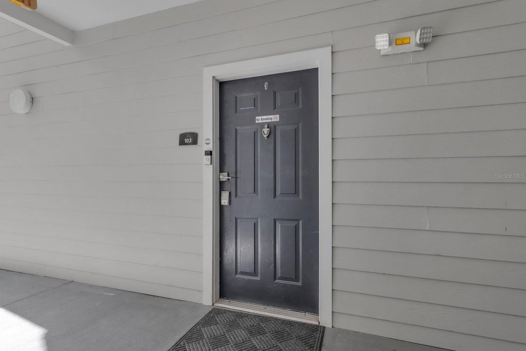 Photo of 3175 Feltrim Place #103, Kissimmee, FL 34747 (MLS # O6441799)