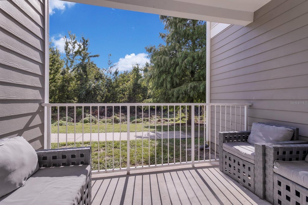 Photo of 3175 Feltrim Place #103, Kissimmee, FL 34747 (MLS # O6441799)