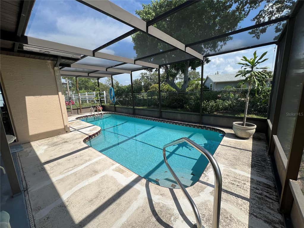 Photo of 7828 Royal Stewart Drive, New Port Richey, FL 34653 (MLS # O6429902)
