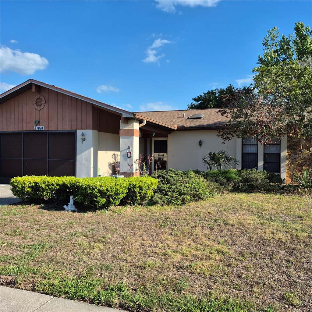 Photo of 7828 Royal Stewart Drive, New Port Richey, FL 34653 (MLS # O6429902)