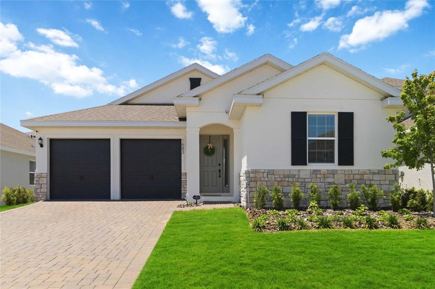 One or more photo(s) has been virtually staged. Welcome to 1683 Cadence Street—this highly upgraded Anna Maria model offers 4 bedrooms, 2.5 bathrooms, and 2,235 square feet of thoughtfully designed living space. The open-concept layout features a spacious great room that flows seamlessly into the dining area and a beautifully appointed gourmet kitchen, complete with a built-in refrigerator, 36” hood and cooktop, three-drawer base, oversized island, quartz countertops, and all KitchenAid appliances.

This home showcases luxury vinyl flooring throughout (excluding two bedrooms and closets), along with high-end finishes at every turn. Both the primary and guest bathrooms feature tile extended to the ceiling and raised vanities, while the primary suite offers a spa-like retreat with a rain shower head, private ensuite, and a large walk-in closet.

Additional upgrades include upper and lower cabinetry in the laundry room and a 9x8 pocketing hidden triple slider door that opens to a beautifully landscaped backyard, creating a seamless indoor-outdoor living experience. A covered patio and two-car garage complete this exceptional home.