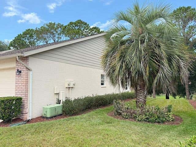 Photo of 2232 Springmeadow Drive, Spring Hill, FL 34606 (MLS # TB8526402)