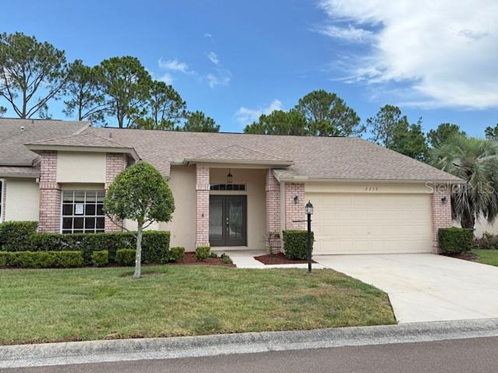 Photo of 2232 Springmeadow Drive, Spring Hill, FL 34606 (MLS # TB8526402)