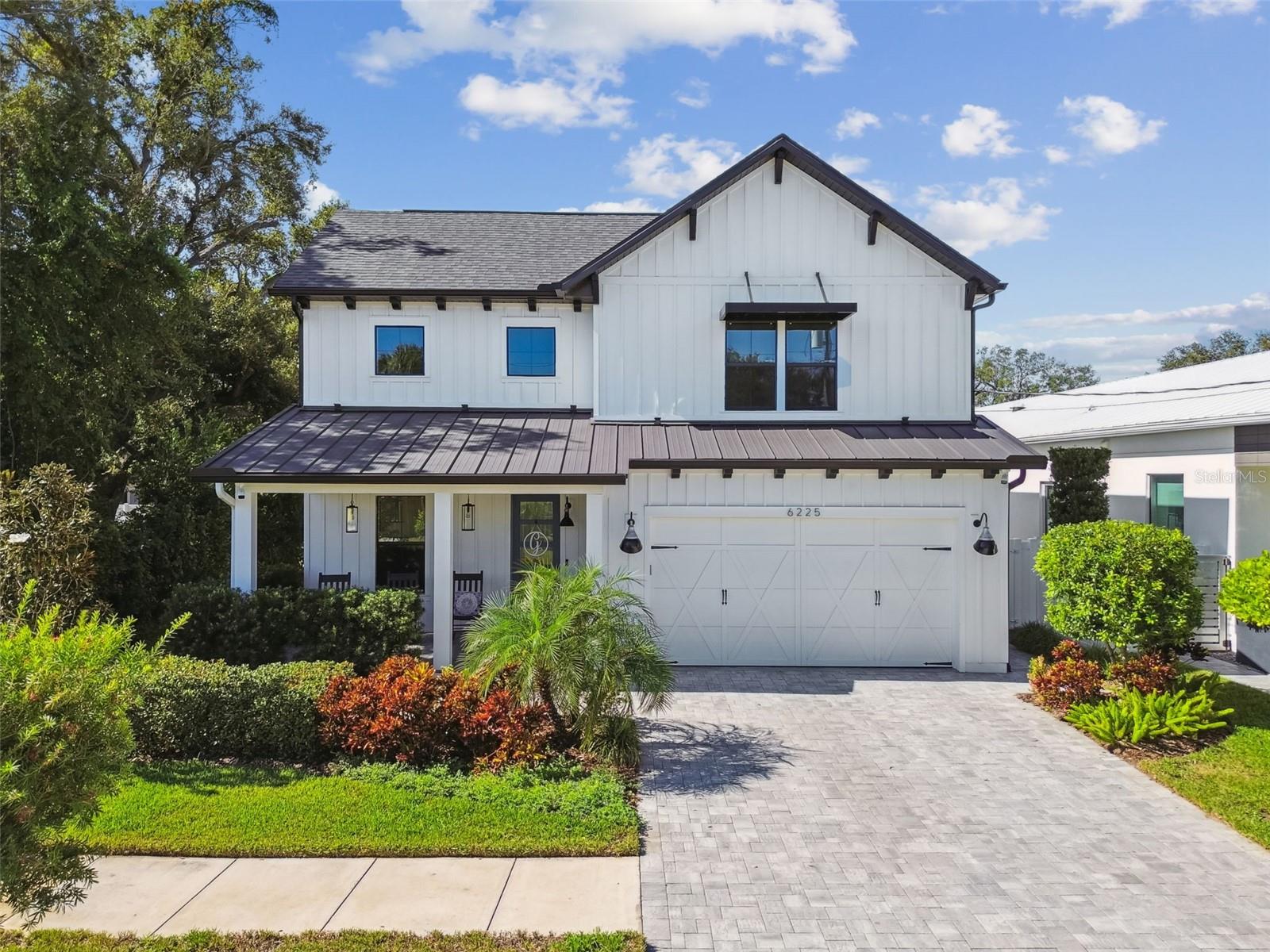 One of the Best-Built Homes in South Tampa
Every so often, a home is built that sets a new standard where craftsmanship, design, and integrity align perfectly. Custom built in 2021 by Castle Construction & Design, this modern farmhouse stands among the best-built homes in South Tampa a rare combination of timeless materials, meticulous detailing, and enduring strength.
Behind its clean architectural lines, the home reveals a depth of quality you can feel in every step. James Hardie board and batten siding, impact-rated M/I windows, and 8-foot doors set the tone for durability and design excellence. Inside, 7” French oak floors, high-end trim throughout, and four-piece door and window casings create an atmosphere of refined craftsmanship. Every element, from the restored vintage industrial lighting to the custom tilework, reflects an obsession with detail that separates this home from the rest.
At its heart, the kitchen combines beauty and performance anchored by a Café 6-burner gas range, Bosch appliances, and a quartz waterfall island designed for both culinary and social connection.
The primary suite feels like a retreat, ensuite embraces rain shower, large soaking tub, and NuHeat heated floors that make every morning feel indulgent.
Technology and infrastructure are equally exceptional: enterprise-grade UniFi Wi-Fi, 8-camera Dahua security system, Rinnai gas tankless water heater, 50-amp generator inlet, and 40-amp EV outlet every system designed for longevity, security, and ease.
Set on an oversized 52.5 x 145 lot, zoned RS-50, the property offers the freedom to create whether that’s a resort-style pool, outdoor kitchen, or lush garden retreat. Mature landscaping, a fully fenced yard, and low-voltage lighting complete the picture of privacy and sophistication.
Even in the fiercest storms, this home stands resilient in flood zone X, 16 feet above sea level, and engineered to perform.
Because while many homes are beautiful, few are built to this standard.