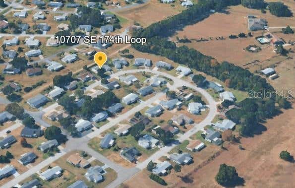 Photo of 10707 SE 174th Loop, Summerfield, FL 34491 (MLS # OM730939)