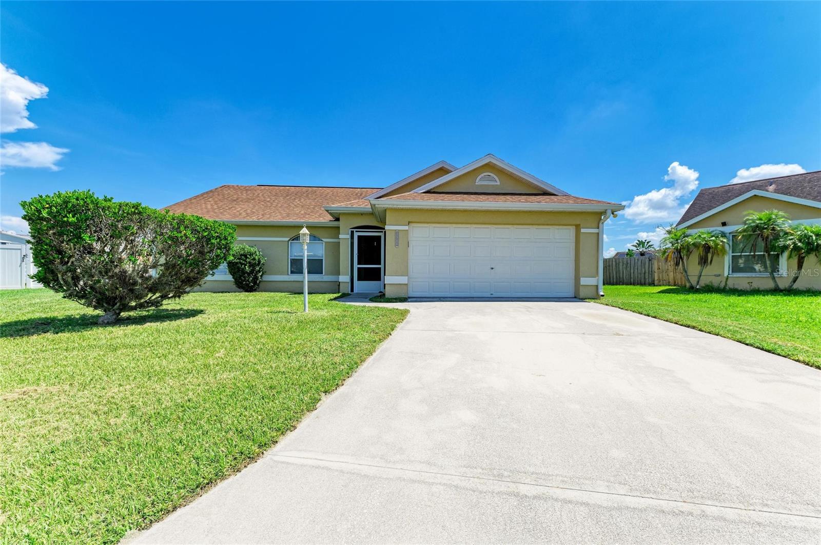 One of the largest lots in the highly desirable Bayou Estates, this beautifully updated 3-bedroom, 2-bathroom home is tucked away on a quiet cul-de-sac and offers a rare combination of privacy, space, and modern upgrades. Freshly painted throughout with new vinyl plank flooring, the home features soaring high-pitched ceilings, an updated kitchen, and a renovated primary bathroom. The open floor plan flows seamlessly to a screened-in lanai that overlooks a massive backyard—perfect for relaxing, entertaining, or even adding a pool. Major system updates include a roof replacement in 2018, a new HVAC system installed in 2021, and updated water heater. Located in a peaceful, established neighborhood with low HOA fees, this move-in ready home is a standout opportunity in one of Palmetto’s most sought-after communities. Don’t miss your chance to make it yours—schedule a private tour today.