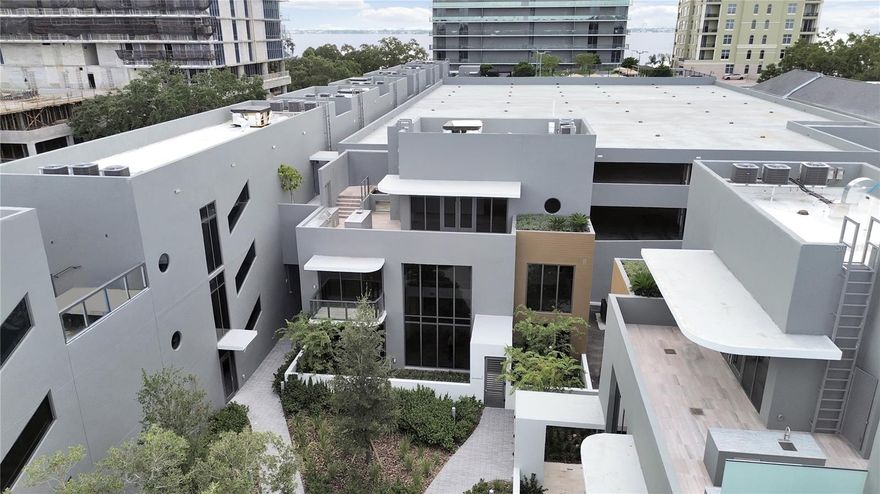 One or more photo(s) has been virtually staged. **THE RITZ-CARLTON Residences , Exclusive Townhome, PURCHASE OR LEASE This Beautiful Home  &  Enjoy all of The Ritz-Carlton Lifestyle and Amenities including Valet service, Doorman & Concierge Desk with Onsite Manager, ** NEW CONSTRUCTION, Luxury, Limited   Tri-Level Townhome,  Located in Beautiful Streetscape Area of Lush landscaping and Wide Sidewalks, This 3600+sqft TH has a very Open and Modern Floorplan, 3 Bedrooms, 4.5 Baths, FR, Greatroom, Den, Entertainment Room, Outdoor Kitchen, & Deck with Rooftop Spa, access to all levels with a  Private Elevator, Perfectly Designed for entertaining and Privacy, Greatroom is open to the 2nd Level, Luxury Kitchen located on 1st Level features: Sub Zero Refrigerator and Wolf Appliances, Cooktop and Built-In Oven and Microwave, Quartz Countertops, Custom Designed Italian Cabinetry by ItalKraft, Highend Kohler Plumbing Fixtures in kitchen and Baths, Laundry Room has full-size front load Electrolux washer/Dryer, **First Level includes:Greatroom, Guestroom with Private Bath, FR, Kitchen and DR, &Half Bath, **Level 2 includes Den (20x12), Primary Bedroom and Luxury Bath, Guestroom wBath, **Level 3 has a huge Entertainment Room(25x11) and a Half Bath, Outdoor Patio forEntertaining (26x10) with Outdoor Kitchen has Grill and fridge & Outdoor Spa, Lush Landscaping thru out the property designed by renowned Landscape Artist. Enjoy all of the Ritz-Carlton Lifestyle and Amenities including Valet Parking, Doorman & Concierge Desk with Onsite Manager …Valet Parking for your convenience or assigned park in Garage Space #24 with EV Charging Station or Out front  #229 Reserved, Call for Details to Lease.