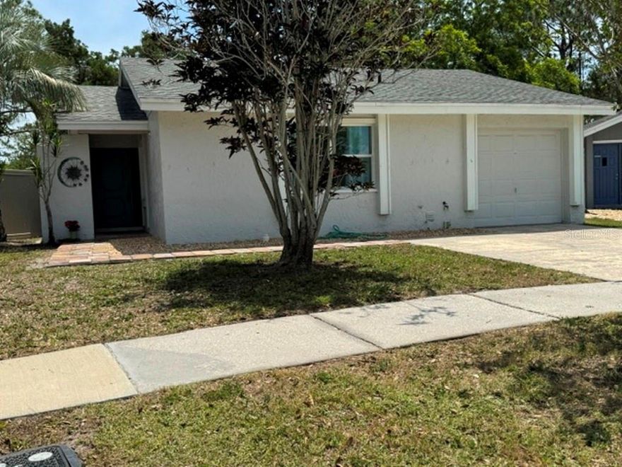 Come see this adorable and updated 3 bedroom 2 bath home with 1438 sq ft of living space. This home has a converted garage giving you extra space to play or live in. Located in the sought after Carrollwood/Citrus park area in the Plantation community this home has many updated features. Dishwasher and Water heater and Stove replaced in 2013-2015. Electrical panel rewired in 2014. Washing Machine, Refrigerator, Roof, Exterior paint, Air conditioner, Jacuzzi walk in shower, Duct work in whole house, Porch screens along with Fresh paint in living/dining area have all been updated between 2018 -2026. You also have granite counters in both baths and kitchen. Large tile in living dining and kitchen, laminate in bedrooms. This home has ample space in the lanai and backyard for entertaining. The neighborhood does have a community pool, bike path, club house and so much more to see. Home is ready to go and Seller can close quickly.