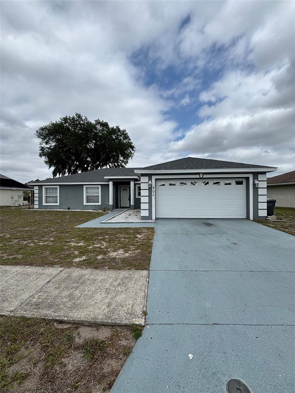 Photo of 205 Golf Aire Boulevard, Haines City, FL 33844 (MLS # S5148317)