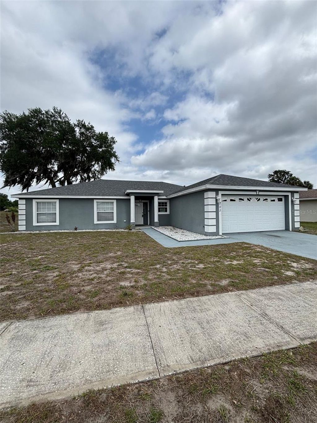 Photo of 205 Golf Aire Boulevard, Haines City, FL 33844 (MLS # S5148317)