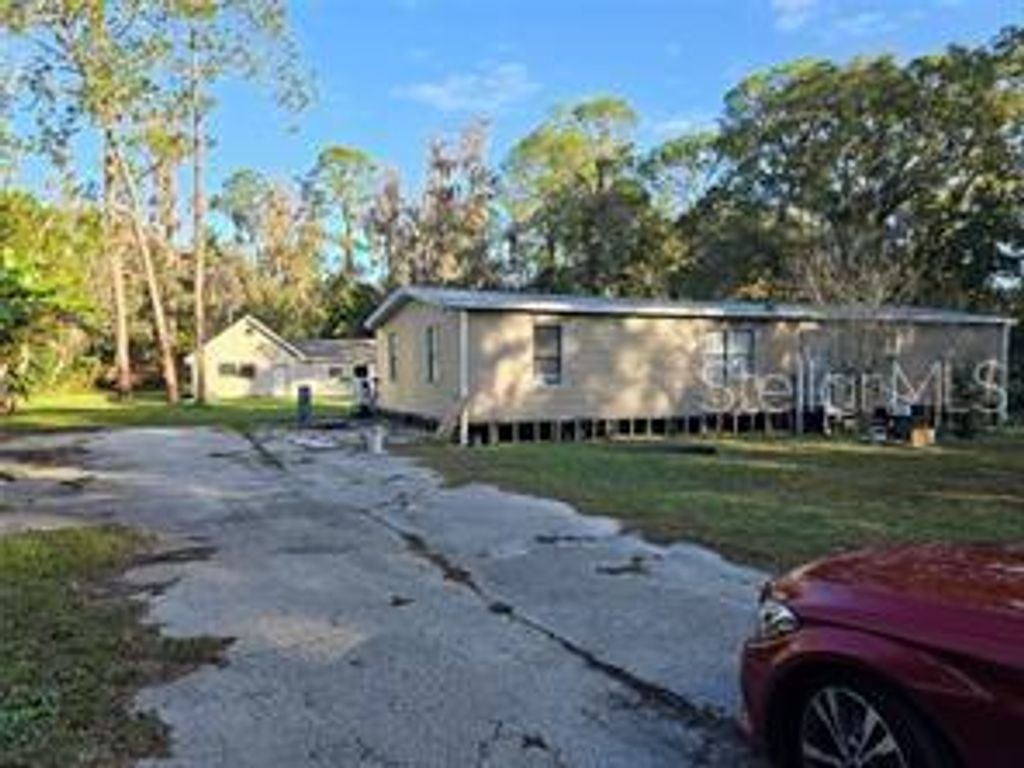 Photo of 6942 Angus Valley Drive, Wesley Chapel, FL 33544 (MLS # TB8459646)