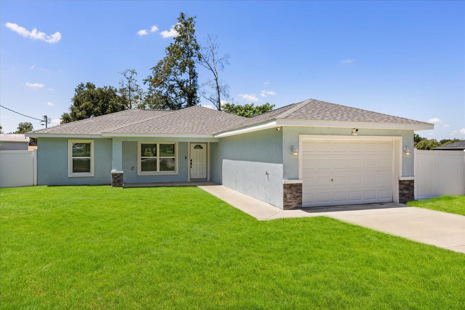 Custom-Built Elegance | Practically New | No HOA | Across from Adena Golf Club
*The seller is open to upgrading the bedroom flooring and offering closing cost assistance—plus, you may even qualify for a lower interest rate. For exclusive details and potential buyer incentives, contact me directly*
Welcome to this custom-built 2023 home, where modern design, timeless finishes, and lifestyle freedom converge. Set on a spacious 0.23-acre fully fenced lot, this exquisite 3-bedroom, 2-bath residence offers 1,378 sq ft of open-concept living, crafted for comfort, entertaining, and effortless living.
Barely lived in and meticulously maintained, this residence feels virtually brand new—without the wait. Enjoy the peace of mind that comes with all major systems completed in 2023, including the roof, A/C, water heater, and drain field. This home is also equipped with hurricane impact-rated, energy-efficient windows for year-round protection, noise reduction, and improved energy savings.
Step inside to discover a thoughtfully designed floor plan adorned with granite countertops, stainless steel appliances, and upscale finishes throughout. The seamless indoor-outdoor flow invites connection and comfort, while the smart home system powered by VIVINT offers full security with cameras, smart doorbell, and keypad entry.
The primary suite is a true sanctuary, featuring private French doors, separate his-and-hers walk-in closets, and a luxurious en-suite bath.
Step outside to your expansive, fully fenced backyard oasis—the perfect canvas for a future pool, garden, or outdoor entertaining space. With no HOA, enjoy the freedom to park your RV, boat, or recreational vehicles without restriction.
Situated directly across the street from the prestigious Adena Golf Club, you’ll be just steps from one of Ocala’s most exclusive destinations—renowned for its world-class course, breathtaking scenery, and refined lifestyle amenities.
Located just minutes from the World Equestrian Center, The Jockey Club, and downtown Ocala, the home is also conveniently positioned near major roads and highways, making it a smart choice for commuters or anyone seeking quick access to Gainesville, Tampa, Orlando, and Florida’s natural springs and beaches.
Whether you're a first-time homebuyer, a savvy investor, or looking to diversify your real estate portfolio with a short-term rental or income-producing property, this residence delivers elevated living with endless possibilities.
Don’t miss your chance to own a custom-built home across from Adena Golf Club—schedule your private tour today.