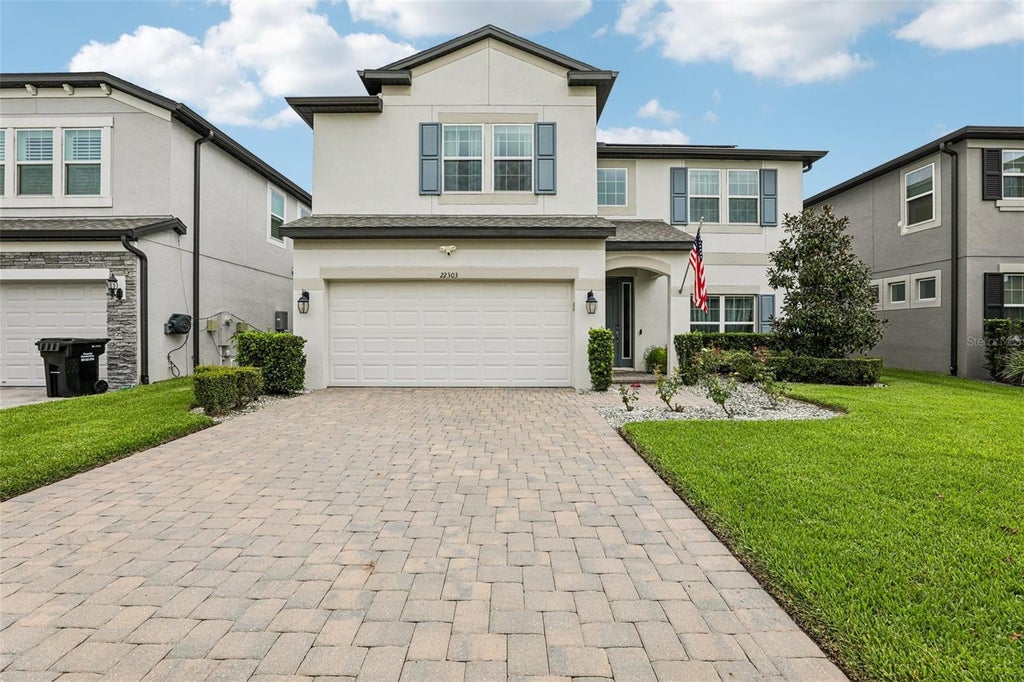Photo of 22303 Woodmen Hall Drive, Land O Lakes, FL 34637 (MLS # A4707534)