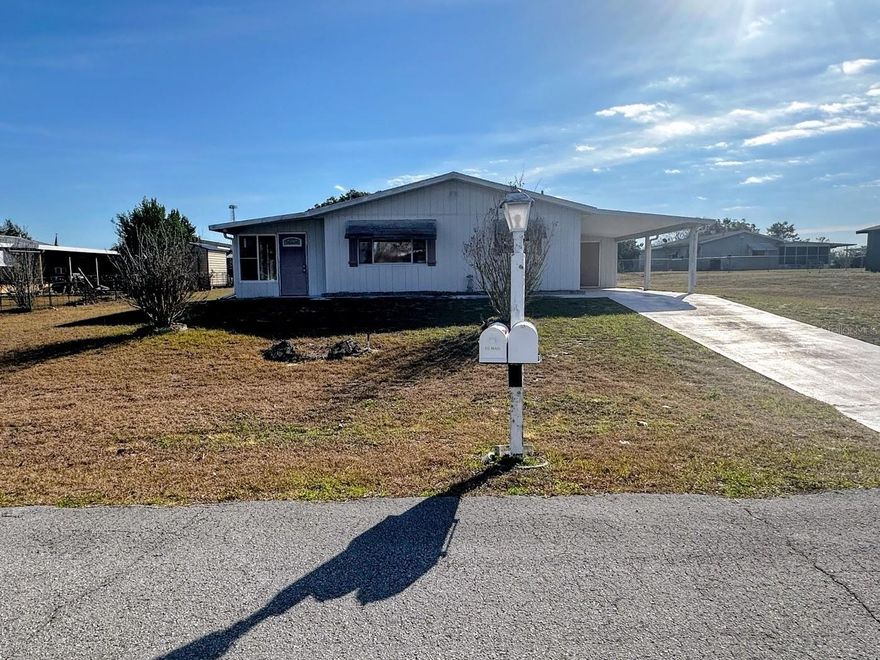 --INVESTMENT OPPORTUNITY FOUND HERE!-- Welcome to Ocala's Pine Run Estates, a 55+, low-HOA, pet and golf-cart friendly community where you OWN YOUR OWN .21-acre lot! NO LOT RENT/ NO FLOOD ZONE. This 1,144 square foot, single family home offers BIG INVESTMENT POTENTIAL. This property feels spacious, a lovely floor plan with open-concept living and dining space, sliders leading to the covered side porch. Two larger bedrooms and 2 full baths provide functionality. We love the storage space including the primary bedroom's walk-in closet, hallway linen closet, plus 2 bathroom closets for your items. Enjoy gated, paved-road entry from Hwy. 200- your home sits high on the land, offering curb appeal, and easy covered, carport parking. Washer/ dryer hookup located in the additional storage room. The low monthly HOA provides access to the clubhouse, community pool, fitness center, tennis courts, and covers trash pickup. FIXER UPPER opportunity, AS-IS Cash Sale, Pet-friendly, fences OK, properties may be leased. If you are looking for your next project this Spring Season, DON'T MISS this one! Priced to Sell Quickly!