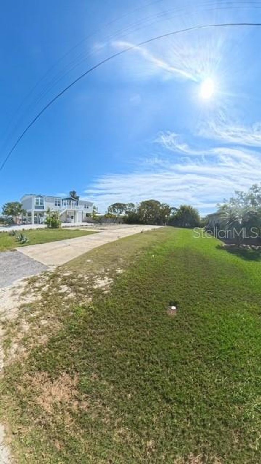 Live the coastal Florida lifestyle at its best! This ready-to-build lot at the end of 106th St W offers nearly 10,000 sq ft with platted zoning that allows for either a single-family home or conversion back to its original duplex designation—perfect for personal use, multi-generational living, or income-producing potential. Enjoy deeded water access with a private boat ramp, and full freedom with no HOA, no deed restrictions, and short-term rentals allowed. Just minutes to IMG Academy and under two miles to the Cortez Bridge leading to Anna Maria Island and Longboat Key. Located directly across from Peninsula Bay, a planned 359-acre waterfront community featuring a marina, public boat access, nature trails, and 90,000 sq ft of retail and dining. Bring your building plans—or work with our trusted local builder who has experience designing both custom homes and duplexes on nearby lots. Seller may consider short-term owner financing while you finalize permits.