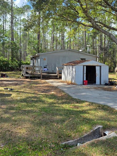 Photo of 24326 Maxwell St, Astor, FL 32102 (MLS # V4947752)