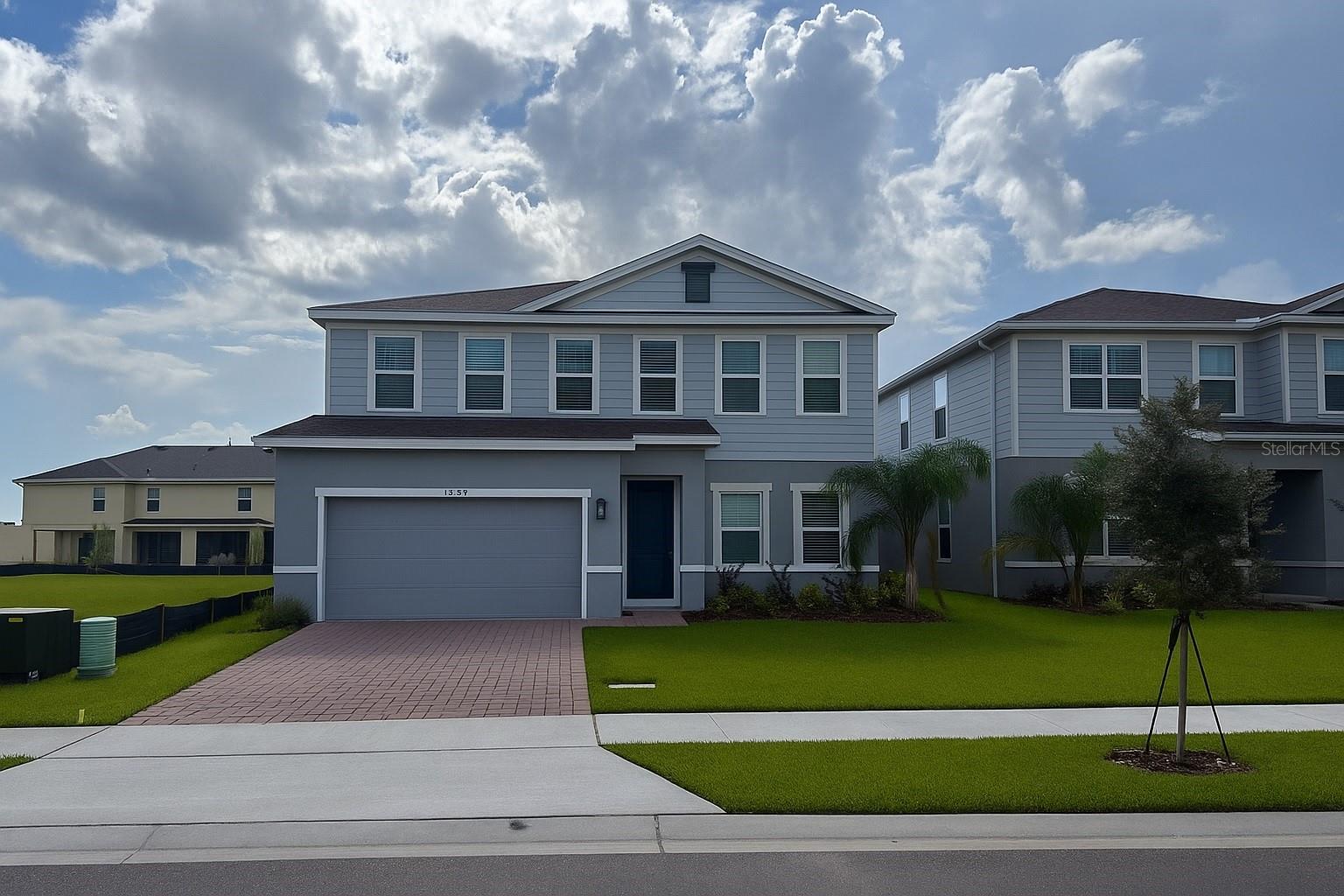 QUICK MOVE-IN! Welcome to The Crossings, located in the quaint city of St. Cloud. This amenity-rich community offers a pool, splash pad, a playground for the kiddos, and a dog park – you can have this and more right outside your door. Conveniently located off Narcoosee Rd, just 15 minutes to Lake Nona’s medical city, SR 417, and the Turnpike, for an easy commute around town, no matter where your travels take you. The Lynn Haven single-family home lives up to expectations. Step into elegance with this spacious two-story residence featuring five bedrooms and four full bathrooms. The oversized master suite is a true retreat, offering two expansive walk-in closets, a window above the vanity for natural light, and a beautifully tiled shower. With a built-in seat and decorative accents. A versatile loft area provides additional living space, while a conveniently located downstairs bedroom with a full bath is perfect for guests or multi-generational living. The heart of the home is the open-concept kitchen, dining, and family room—designed to împress with its generous layout and abundant natural light, creating a warm and inviting atmosphere ideal for both everyday living and entertaining. You can have it all in The Lynn Haven. All Ryan Homes now include WIFI-enabled garage opener and Ecobee thermostat. **Closing cost assistance is available with use of Builder’s affiliated lender**. DISCLAIMER: Prices, financing, promotion, and offers subject to change without notice. Offer valid on new sales only. See Community Sales and Marketing Representative for details. Promotions cannot be combined with any other offer. All uploaded photos are stock photos of this floor plan. Actual home may differ from photos.