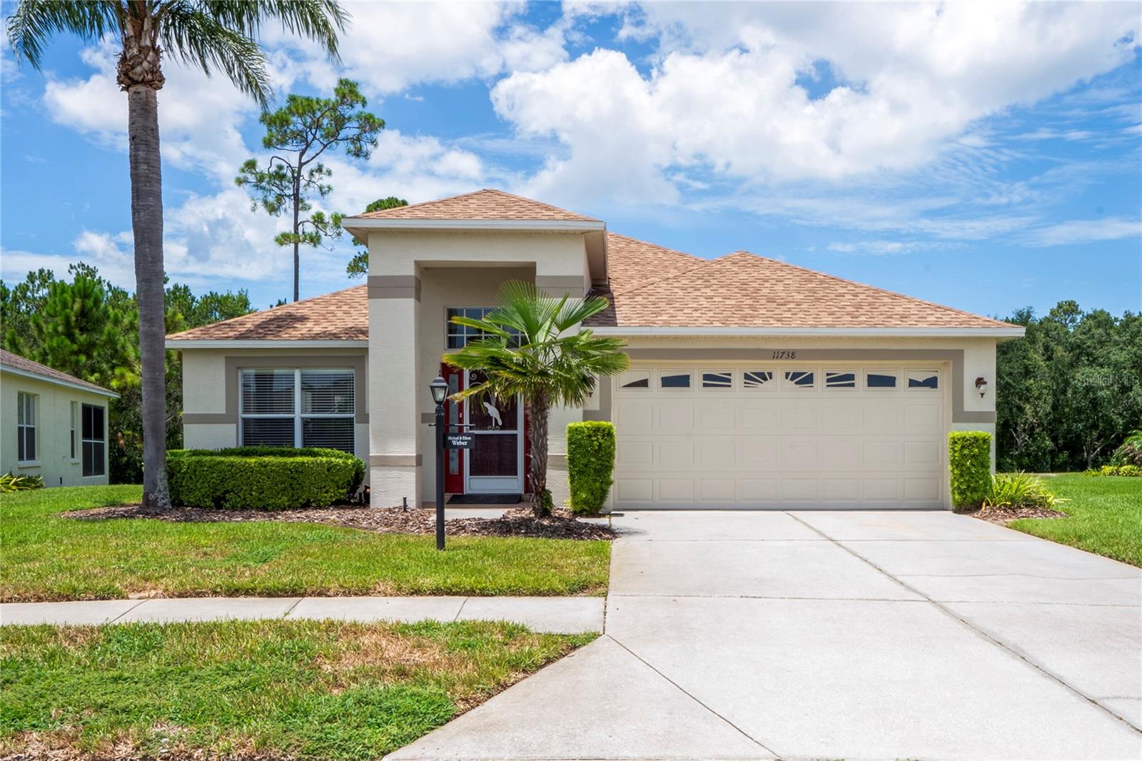 Welcome to sought after 55+ Heritage Pines, offering country club living at it's best. This home has an oversized lanai that looks over mature trees and golf course fairway but still gives a quiet private setting. It comes completely furnished. All appliances in kitchen and brand new washer and dryer in laundry room. The main primary suite is spacious and has it's own private bath with double sinks, soaking tub, large separate shower and linen closet. The walk in closet is more than spacious, it's awesome. Off of the main suite is a perfect office space or library. The additional two bedrooms share a bath and is separate from the main suite. The family room and kitchen are perfect for family functions, while the living room dining room work well with formal gatherings. The roof was installed on 07-25-2022 and the interior has been freshly painted. Heritage Pines has a restaurant/lounge, 18 hole golf course, billiard room, work out center, tennis, pickle ball, pool, hot tub, many card and craft clubs, and the PAC room has entertainment every week. Sellers will pay the $2000. New Resident fee.