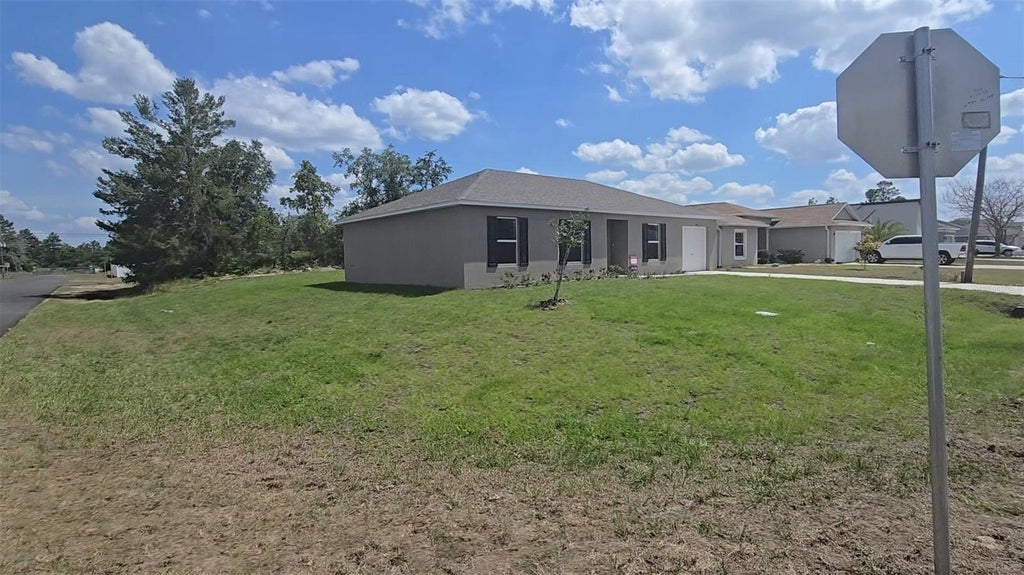 Photo of 100 Willow Drive, Poinciana, FL 34759 (MLS # C7530217)